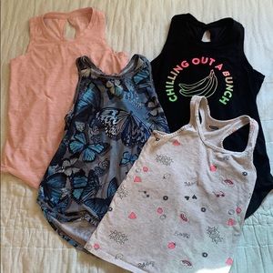 Four Old Navy tanks